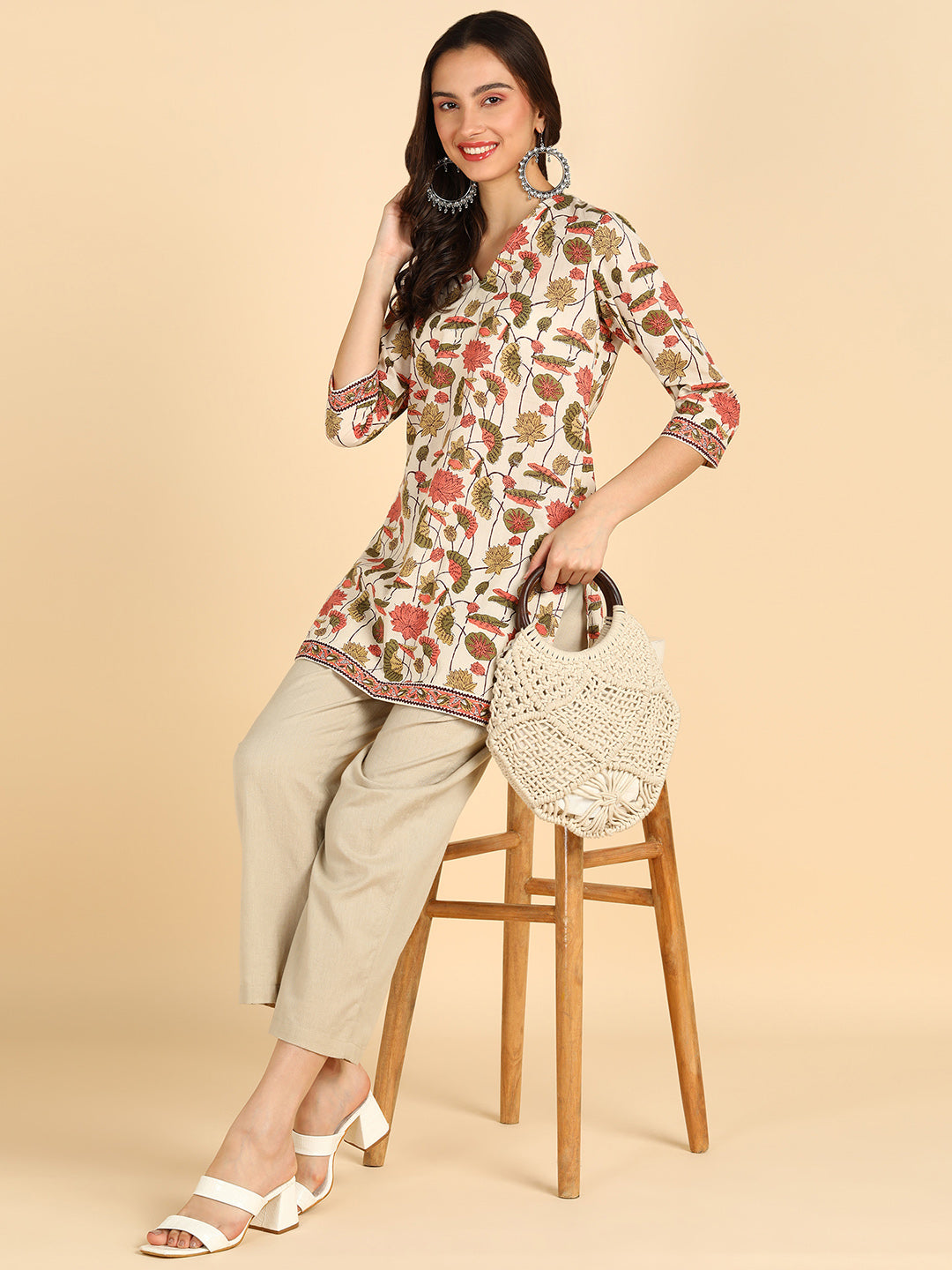 Floral Printed Cream Straight Kurti With Border Details