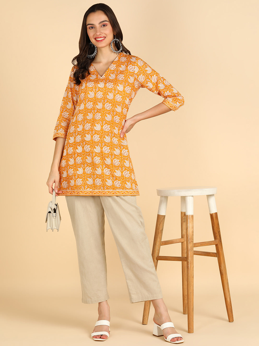 Floral Printed Yellow Straight Kurti With Border Details